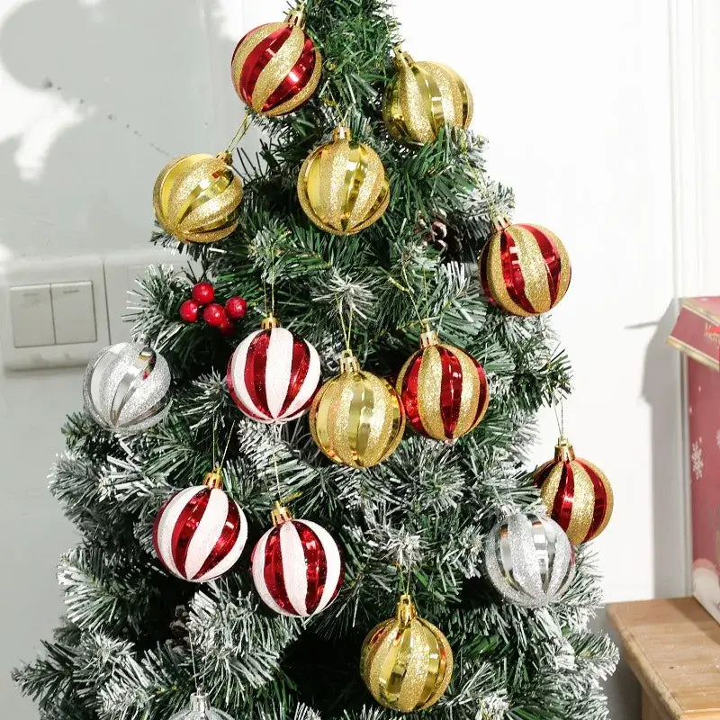 shiny red and gold striped glass christmas ball ornaments hanging on a frosted green christmas tree set of 6 and measuring 6cm each