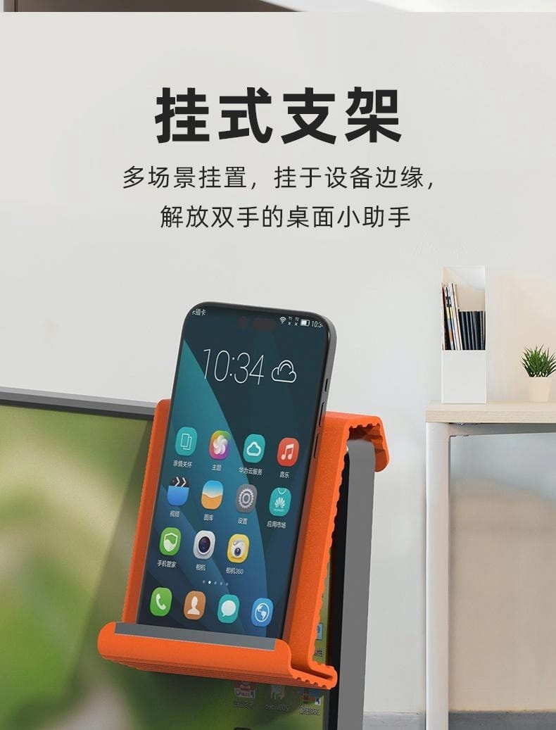 Soporte para teléfono plegable tipo perezoso con abrazadera de silicona color naranja, con base gris que sujeta un smartphone en posición vertical.