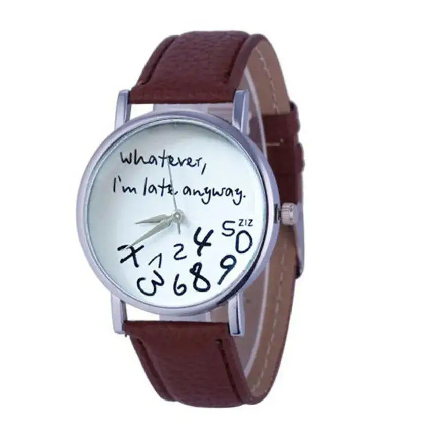 Brown leather strap women watch with a silver-toned case and a white face featuring the phrase whatever im late anyway in black handwritten script.