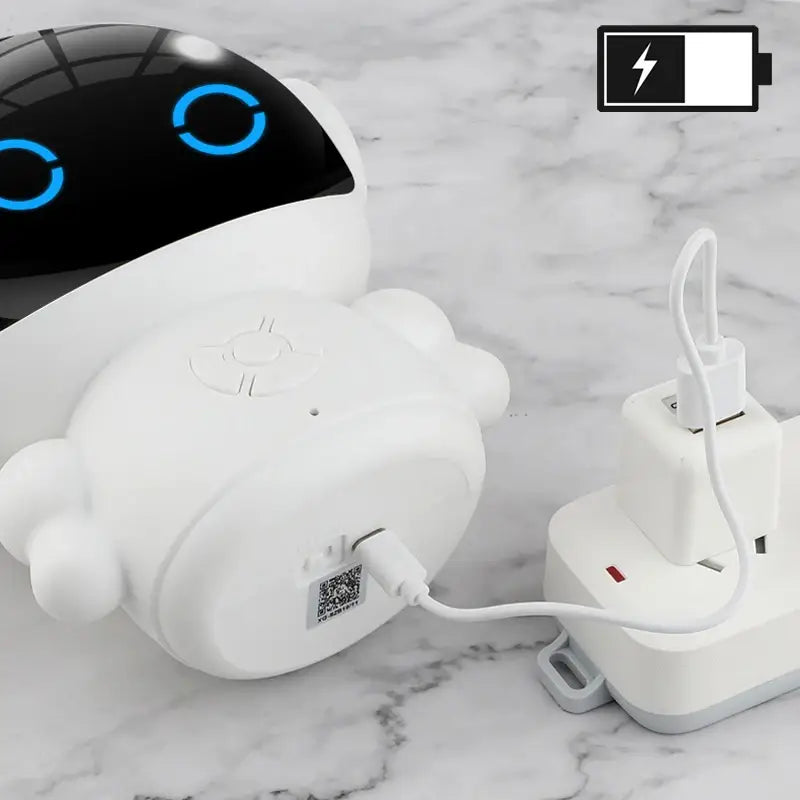 発光する青い円形の目と背面の充電ポートを備えた、Smart Lifeアプリに対応する白色のぬいぐるみ風ロボット形状のスマートAI学習デバイスで、チャットモード連携に対応します。