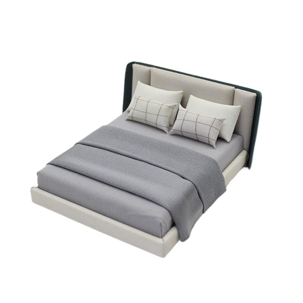 Modern gray upholstered miniature dollhouse double bed with a sleek black headboard and matching pillows featuring subtle grid patterns in cream style bedding.
