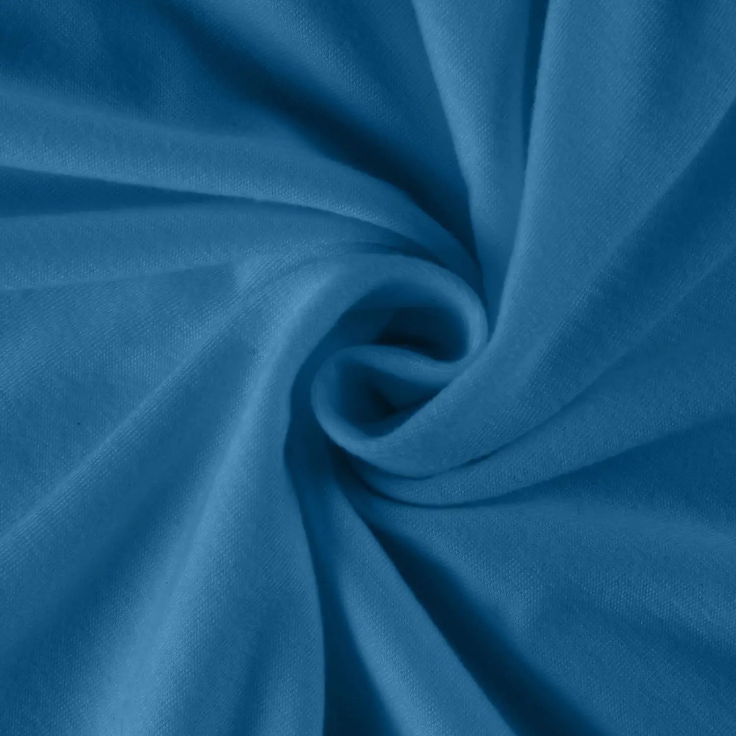 Soft solid blue fleece fabric with smooth texture and subtle sheen on a women long sleeve cotton tunic top featuring a round neck and solid pattern type.