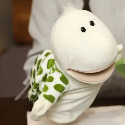 a plush white hand finger puppet with green polka dotted arms and black button eyes designed as educational baby toys featuring lion elephant bunny characters.