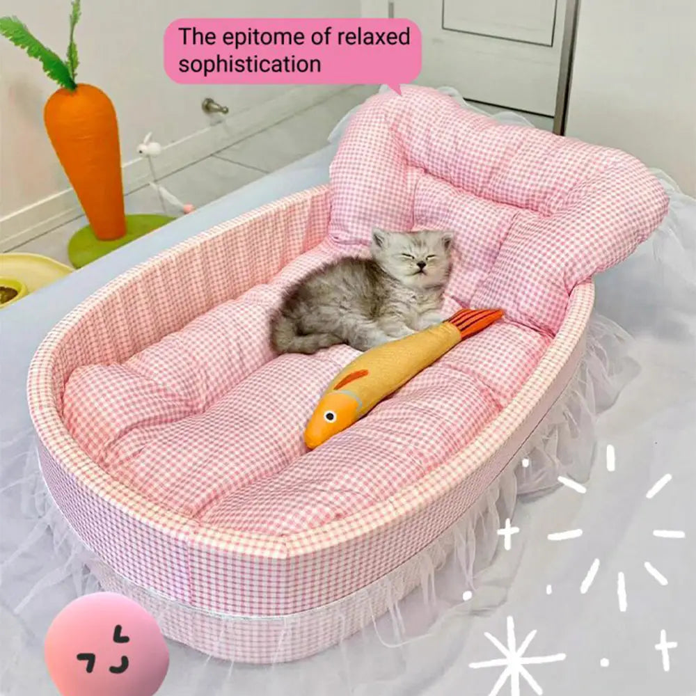 pink and white gingham-patterned oval cat bed with a lace edge and soft plush interior designed as a lace edge plush cat sofa bed