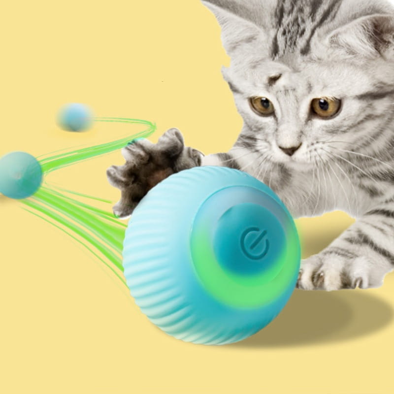 Bola de juguete para gato automática con rodadura acanalada e interactiva en color turquesa y verde, con un botón de encendido en su superficie.