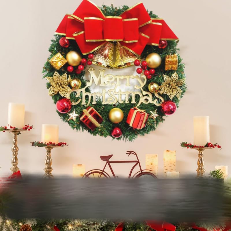 a festive green christmas wreath with a velvet bow adorned with gold and red ornaments miniature gift boxes golden stars and elegant metallic merry christmas lettering for holiday door hanging decor