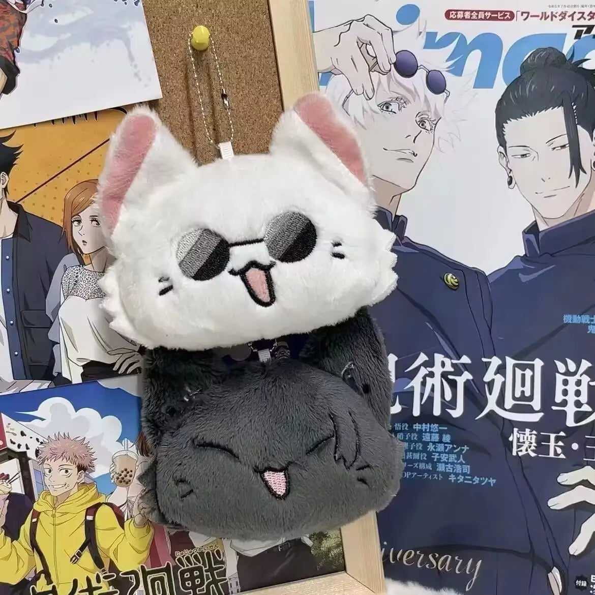 White and gray plush cat keychain with pink inner ears black sunglasses and tongue sticking out from the Gojo and Geto cat plush anime keychain collection.