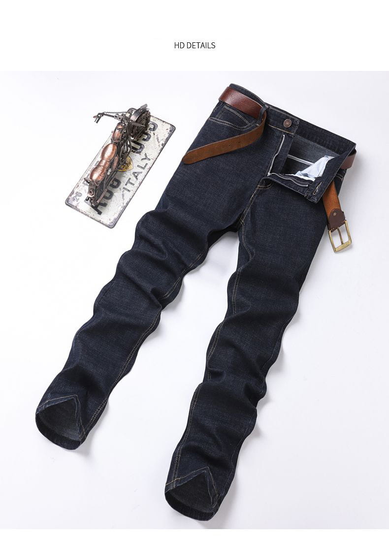 Men’s dark wash stretch cotton straight jeans with a brown leather belt threaded through the waistband for casual wear.