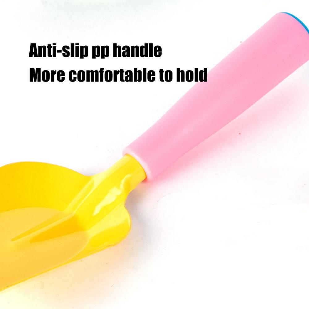 pink and yellow plastic shovel with anti-slip handle included in kids gardening set with tools and watering for outdoor gardening activities