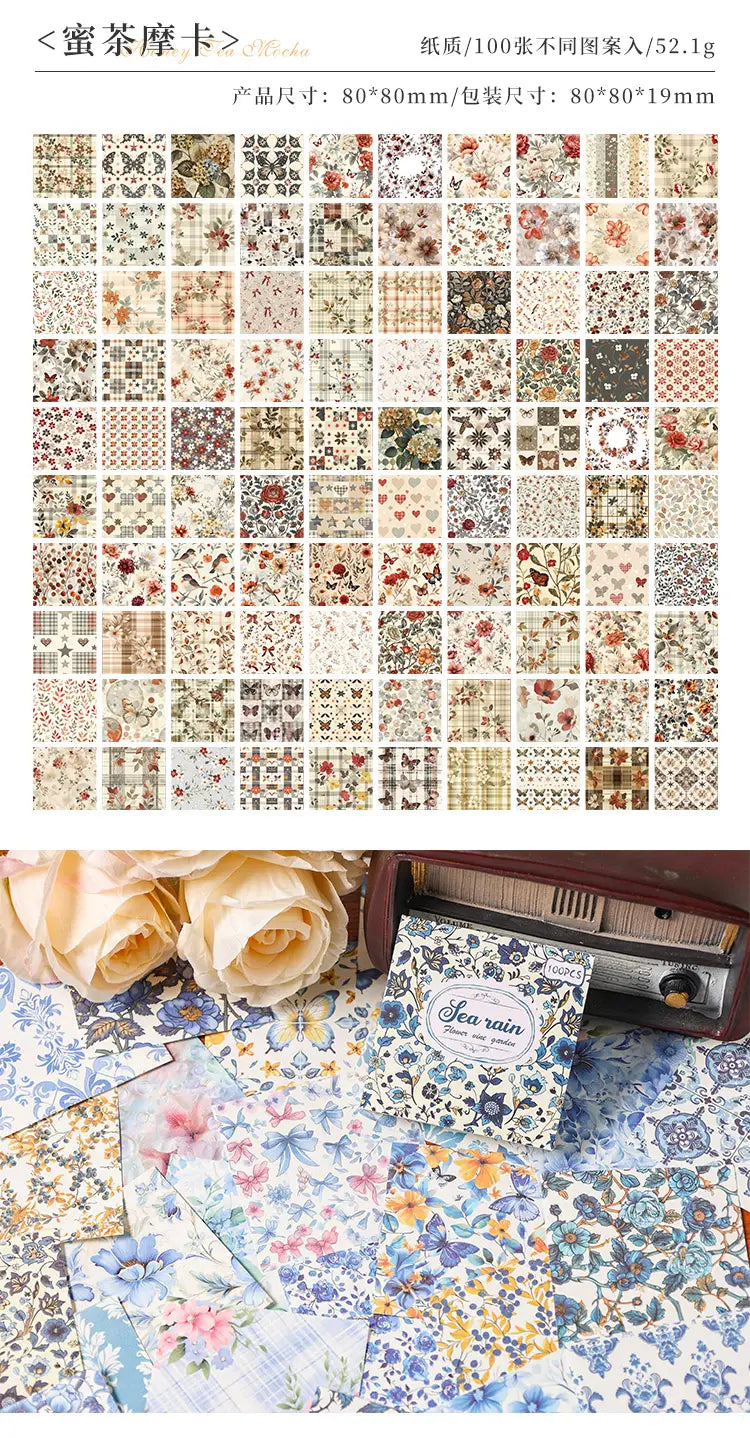 A collection of delicate vintage-style floral scrapbooking paper sheets in soft pastel and muted tones packaged as a set with an elegant sea rain label for journaling supplies.