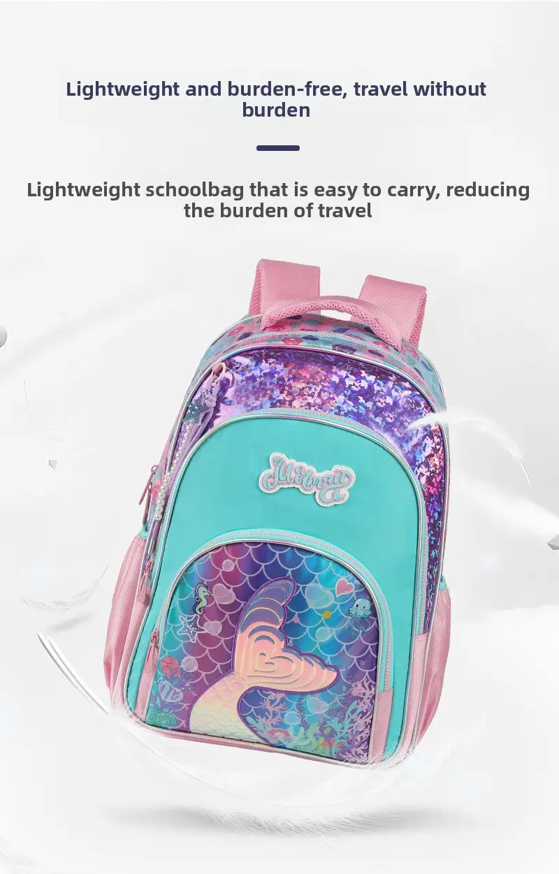 Ein lebhaftes rosa und türkisfarbenes Mädchen-Schmetterlings-Schulrucksack-Set mit einem Meerjungfrauen-Design, gefertigt aus schimmerndem, paillettenbesetztem Material.