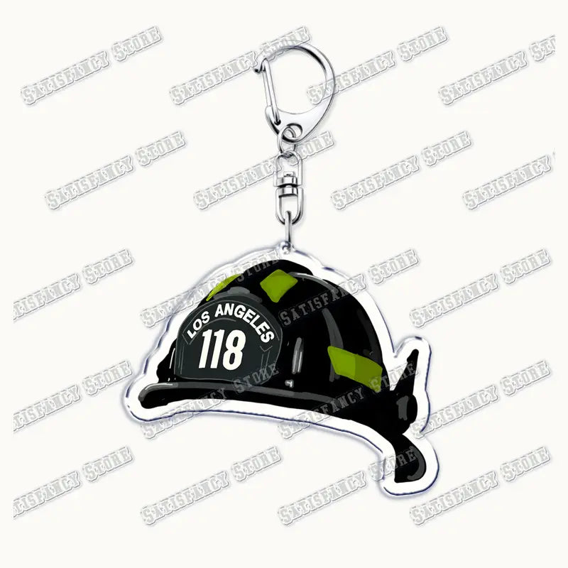 black and green los angeles fire department helmet acrylic keychain with silver metal clip designed as a firefighter gift from the 9-1-1 tv show