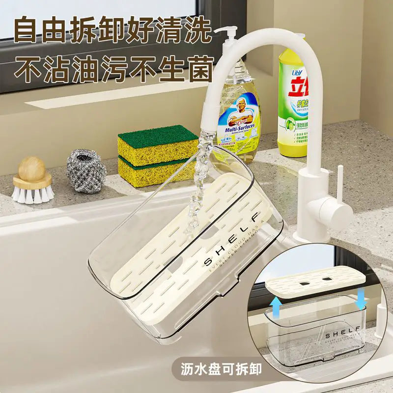 Organizador transparente de fregadero de cocina de plástico con sistema de drenaje, con estante ranurado blanco y bandeja desmontable para una limpieza sencilla.