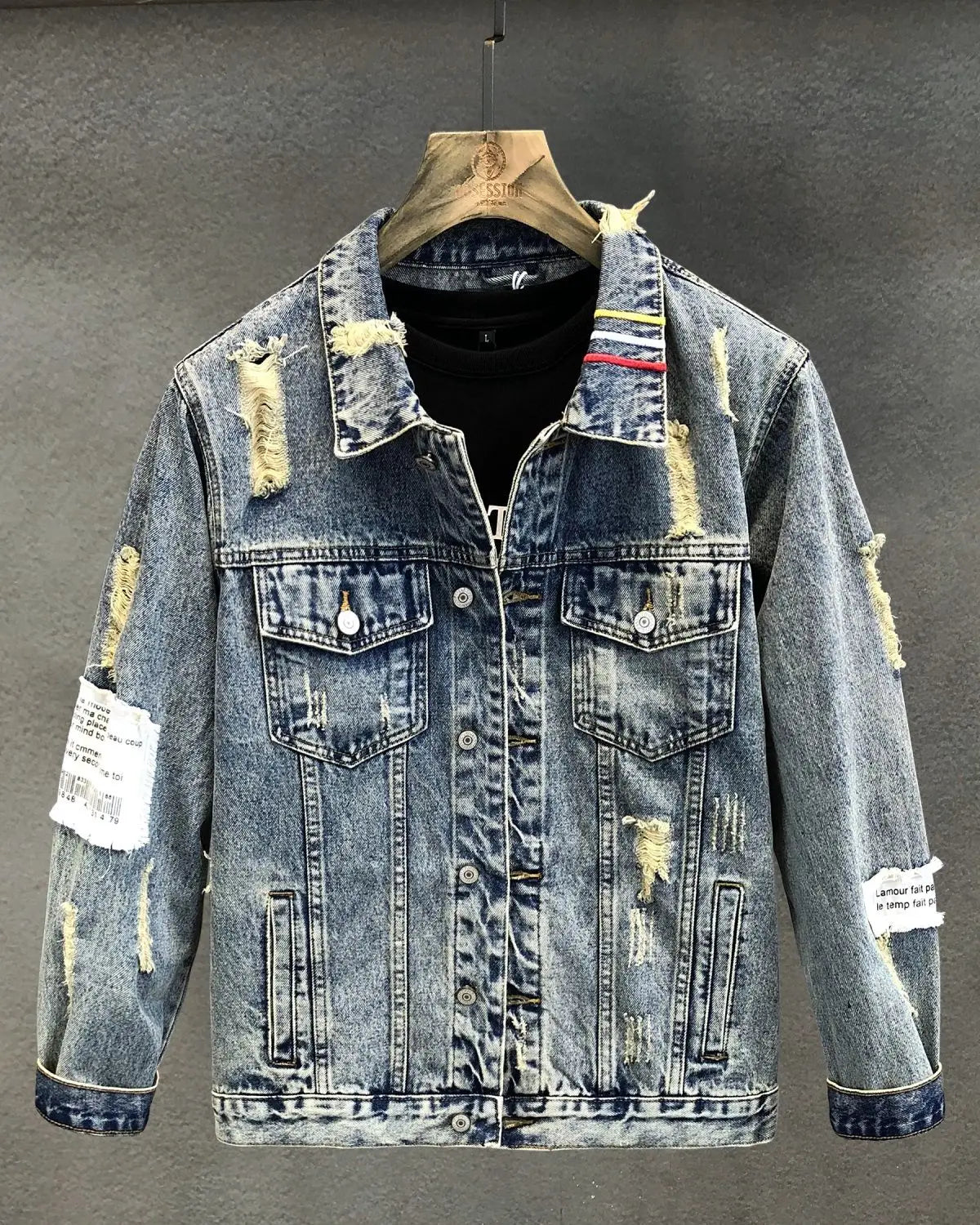 Men embroidered tiger denim jacket in distressed blue denim with ripped details and patchwork accents.