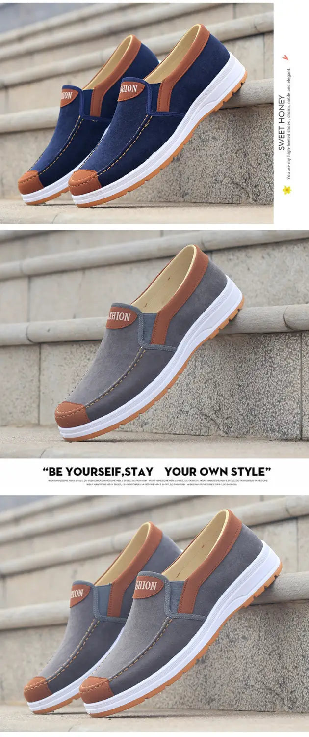Zapatillas casuales de lona tipo botín elástico para hombres en azul marino y gris, con acentos marrones y suelas blancas, diseñadas como calzado ligero para el uso diario.
