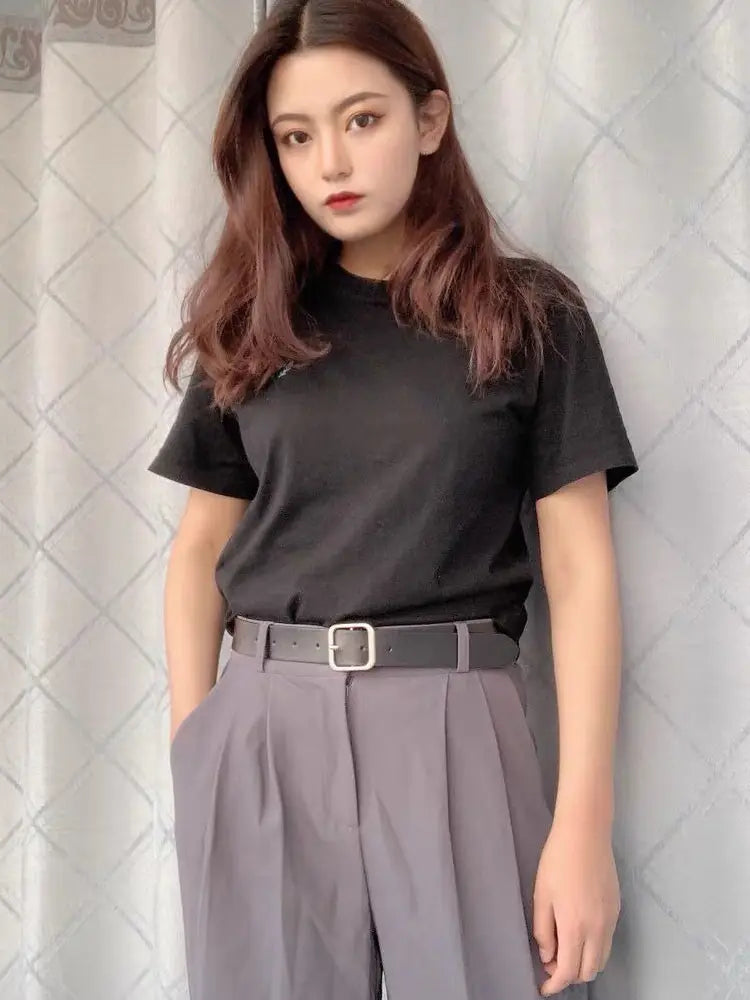 Black leather belt with silver buckle designed for women casual fashion waist strap.