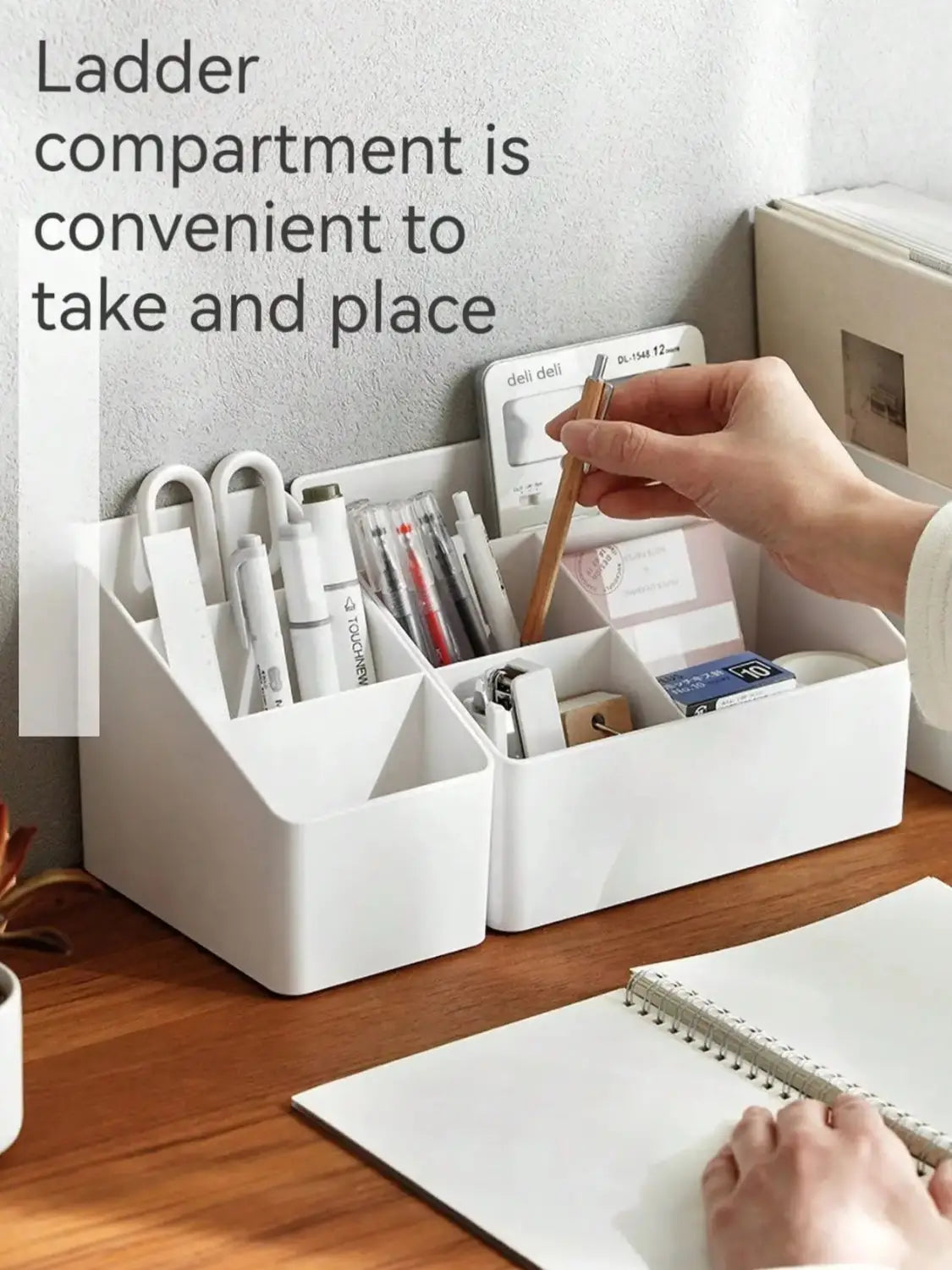 White plastic desk organizer and remote holder features a ladder-style design with multiple compartments for storing pens markers and office supplies.