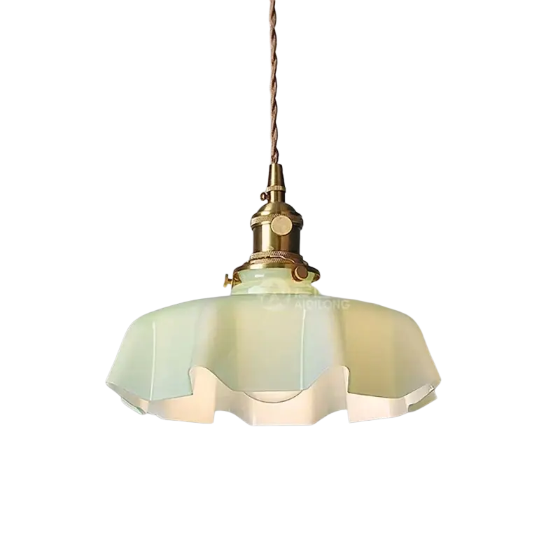 A vintage-style cream pendant light with brass fixture and opalescent ruffled glass shade for dining or bar use