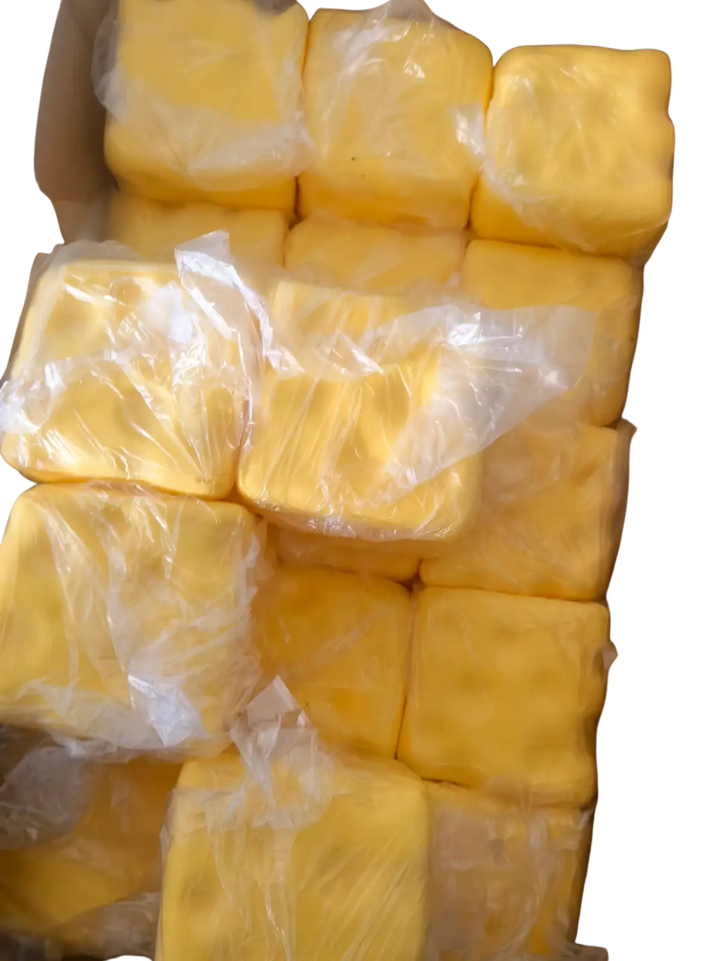 Yellow square-shaped cheese shaped slow rising squishy toys wrapped in clear plastic from a front view