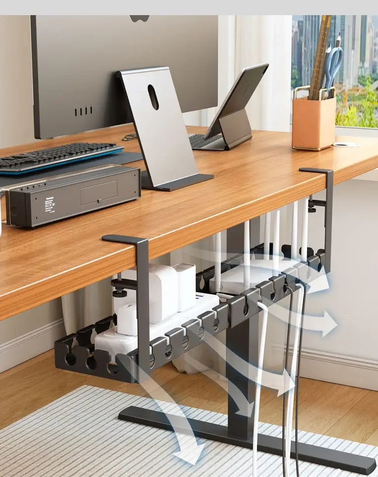 Black metal desk cable management tray with adjustable clamps and multiple slots for organizing cables.