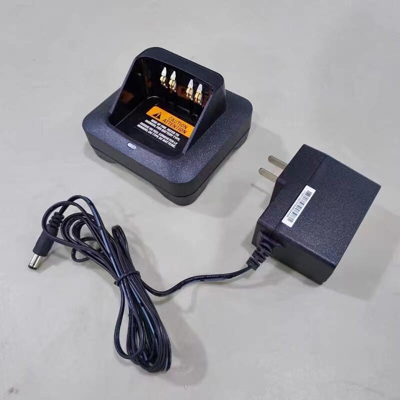 black plastic desktop base charger with gold contacts and matching power adapter for motorola xts2500 xts1500 radios