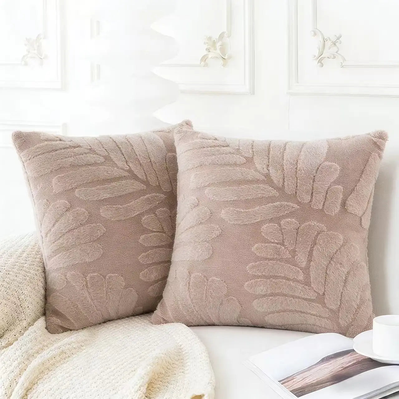 Beige plush leaf embroidered throw pillow covers featuring textured leaf patterns for decorative use.