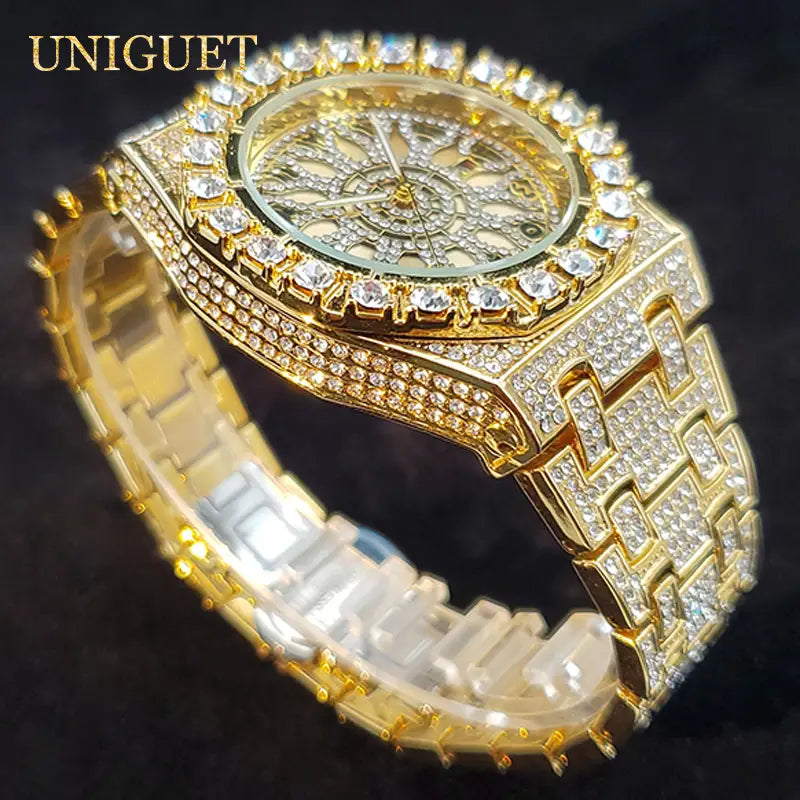 Gold-tone diamond-encrusted iced diamond men’s quartz watch with an ornate face and interlocking link bracelet for luxury hip hop style.