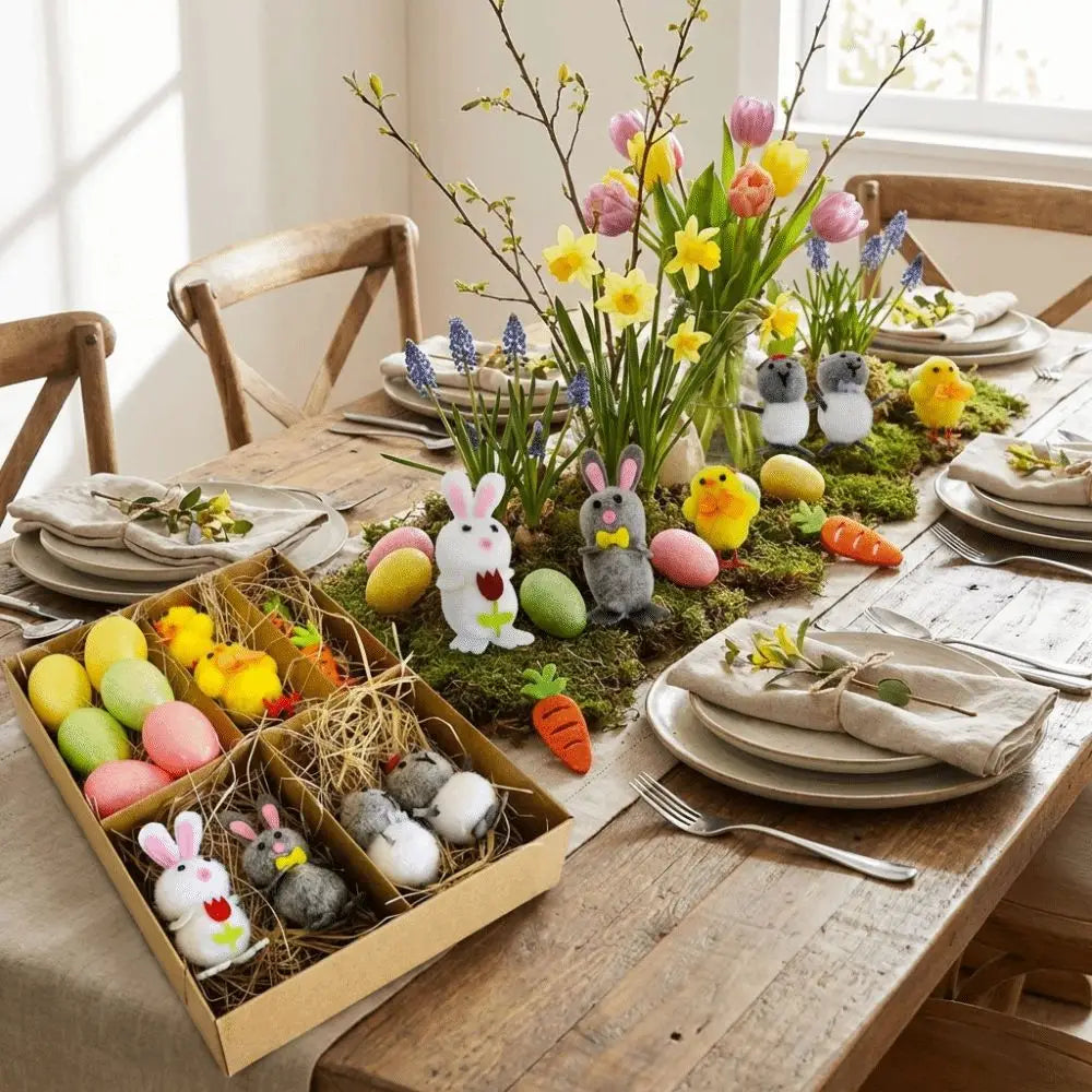 A handmade felt Easter egg and chick figurine gift set featuring plush bunny and chick figurines colorful eggs and faux greenery arranged on a mossy base.
