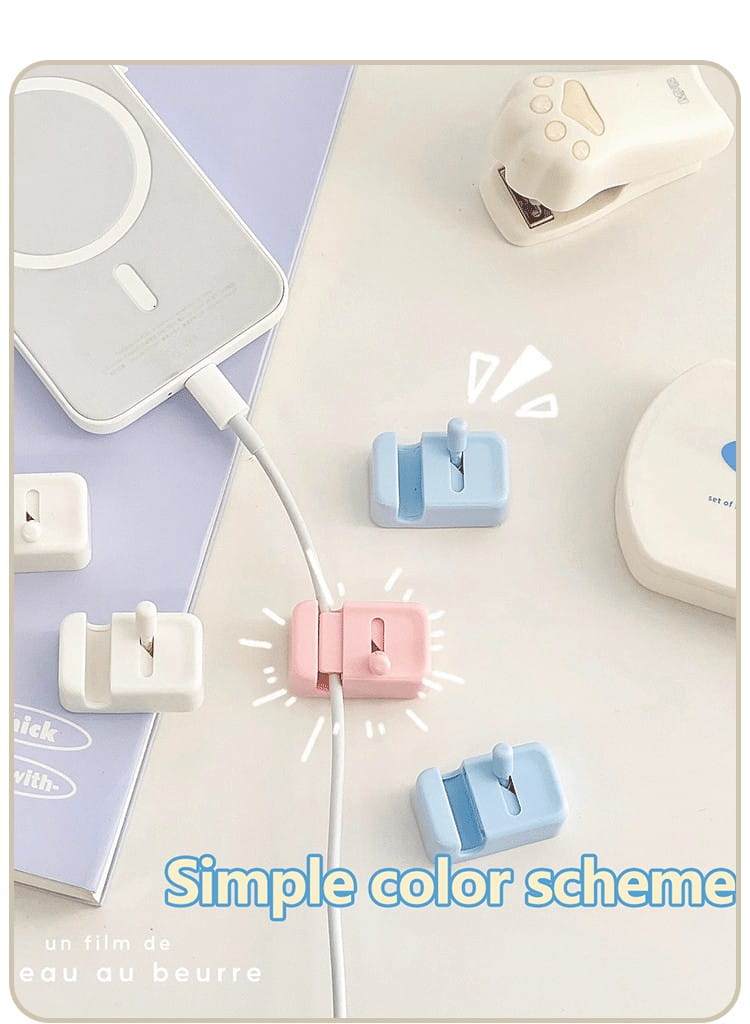 Pince de câble de bureau sans perçage, organisateur de cordons, en plastique rose pastel et bleu clair, au design minimaliste pour la gestion des câbles.