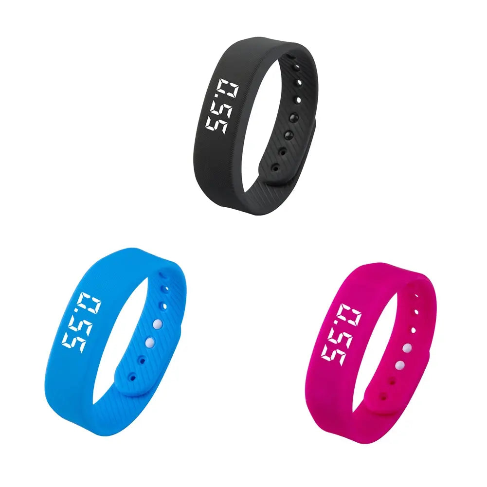 Kids led digital fitness tracker watch featuring three sleek silicone wristbands in black blue and pink with a digital display.