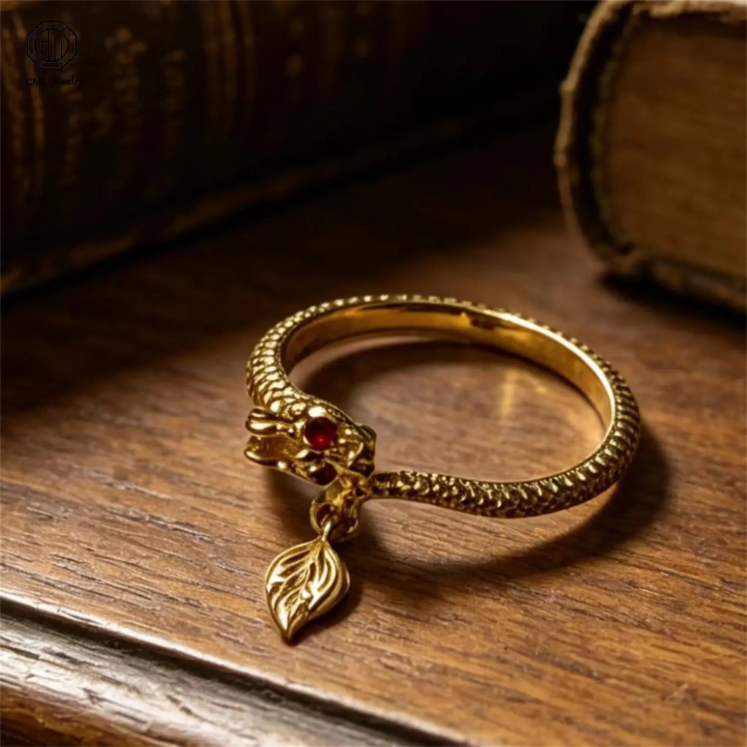 Golden dragon-themed sand gold adjustable ring with a red gemstone eye and ornate leaf pendant featuring a fade resistant matte wide band design.