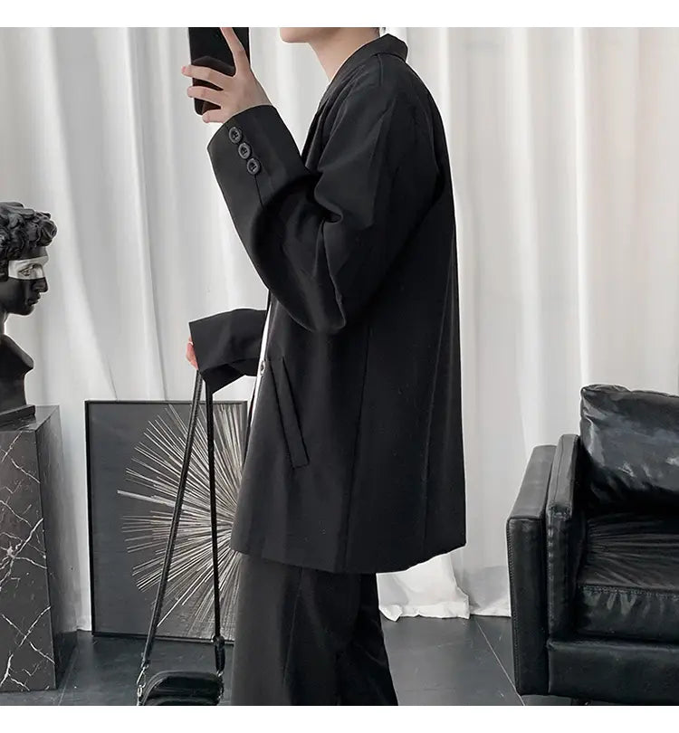 schwarzer übergroßer Blazer mit Dreiknopf-Manschetten und legerer Passform, entworfen für den Freizeitgebrauch aus der Kollektion Herren-Casual-Loose-Blazerjacke in einfarbigem Stil