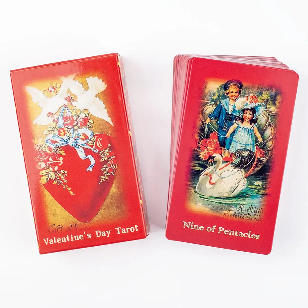 valentine tarot deck love oracle cards featuring vintage red box illustrations of a heart and doves with children in period attire riding swans on one card