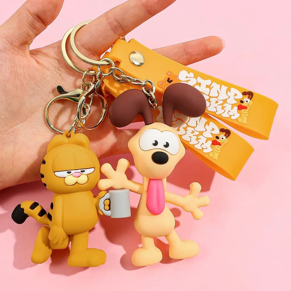 Yellow and brown garfield and odie rubber keychains with matching orange wrist strap for anime cat key pendant use
