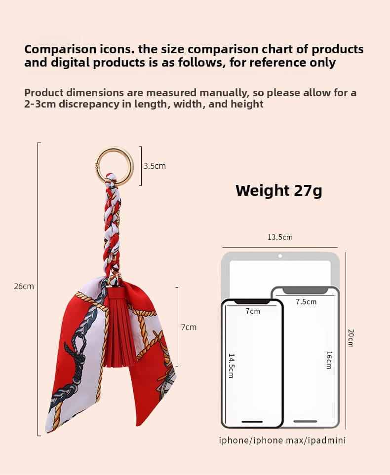 Porte-clés à glands en soie pour sacs, avec un foulard en soie rouge et blanc à motif, agrémenté de détails en chaîne dorée.