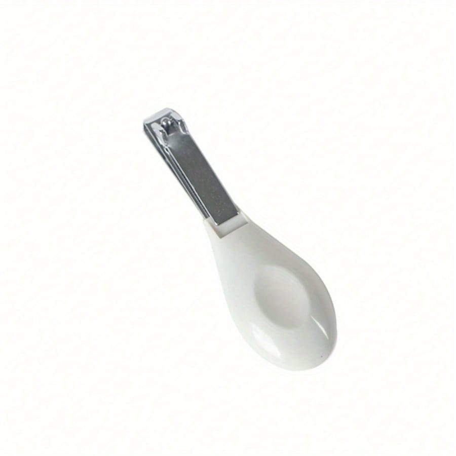 White ceramic nail clipper with a sleek rounded handle and metallic cutting blade from the baby wooden grooming set and healthcare kit.
