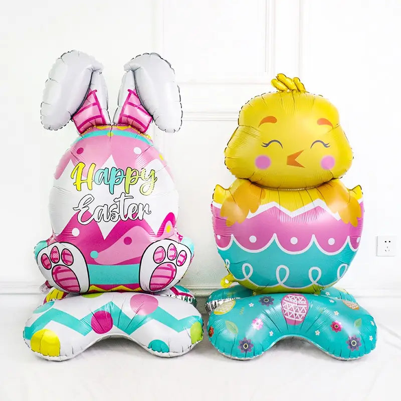 Décoration de fête de ballon-bijou en feuille « lapin de Pâques » en rose et blanc, avec des oreilles argentées, des pois roses et un texte « Joyeuses Pâques ».