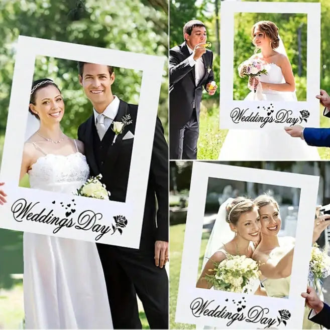 Atrezzo de marco rectangular blanco para fotografía de boda con diseño decorativo de rosa y el día de la boda impreso en guion cursivo negro.