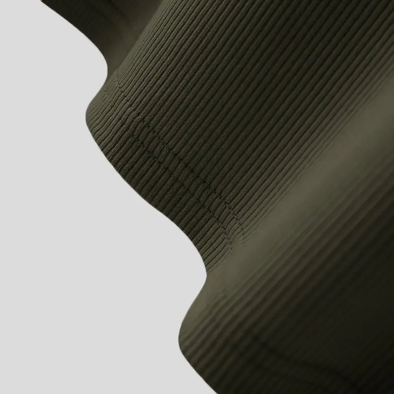 Men solid color casual tank top in olive green ribbed knit fabric with subtle texture and clean stitching.
