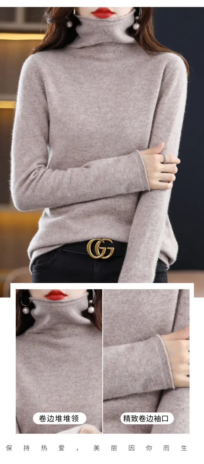 A soft heather gray merino wool turtleneck sweater for women with rolled cuffs and a ribbed neckline.