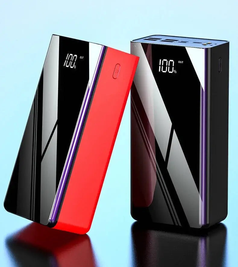 Banco de energía 60000 mAh, cargador portátil con pantalla LED en rojo y negro y acabado brillante, con pantallas digitales que muestran el 100% de carga para una carga eficiente; compatibilidad con dispositivos de carga.