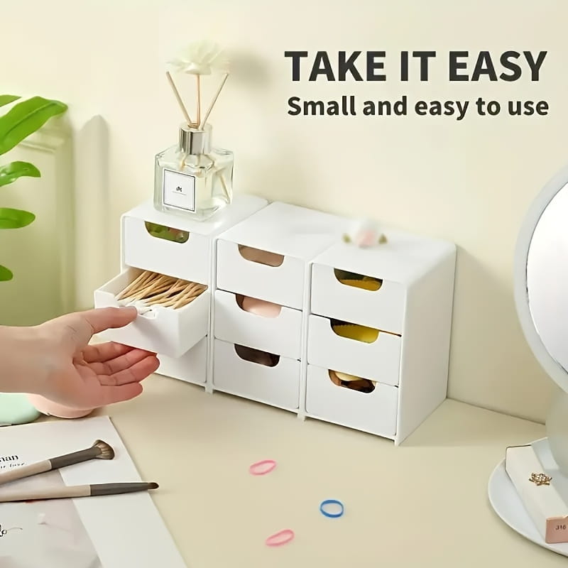 Organizer aus weißem Kunststoff für den Schreibtisch mit Schubladen, die ein schlankes, minimalistisches Design aufweisen, sowie transparente Griffe.