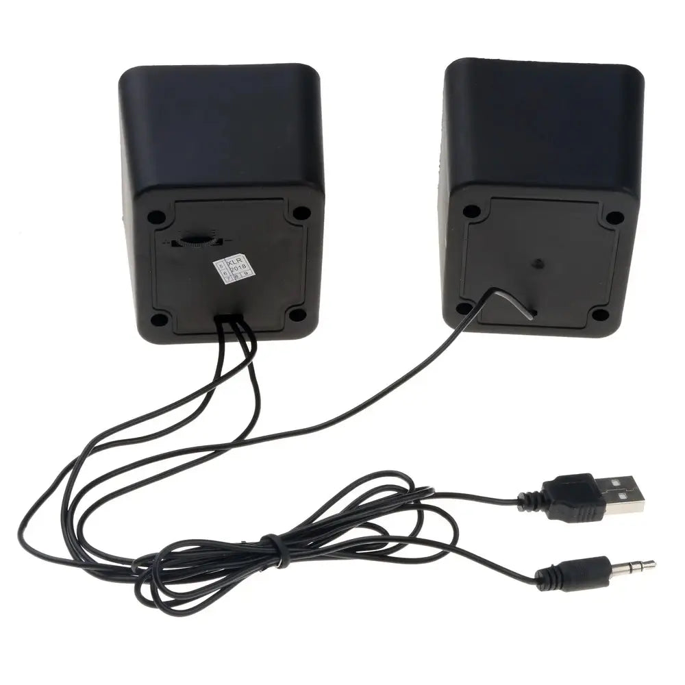 Black rectangular usb computer speakers stereo desktop mini sound system with 3.5mm audio cable for connectivity.