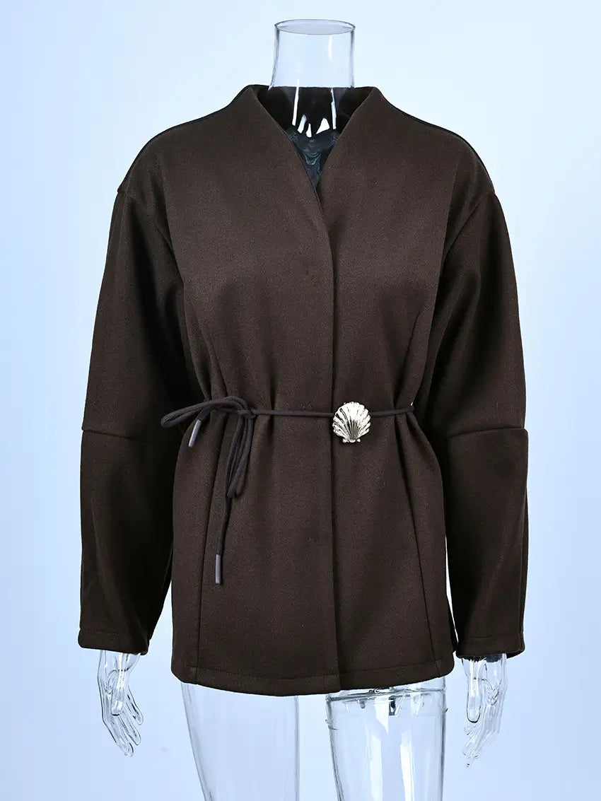 Brown wool belted winter jacket featuring a shell-shaped metallic buckle and matching drawstring waist.