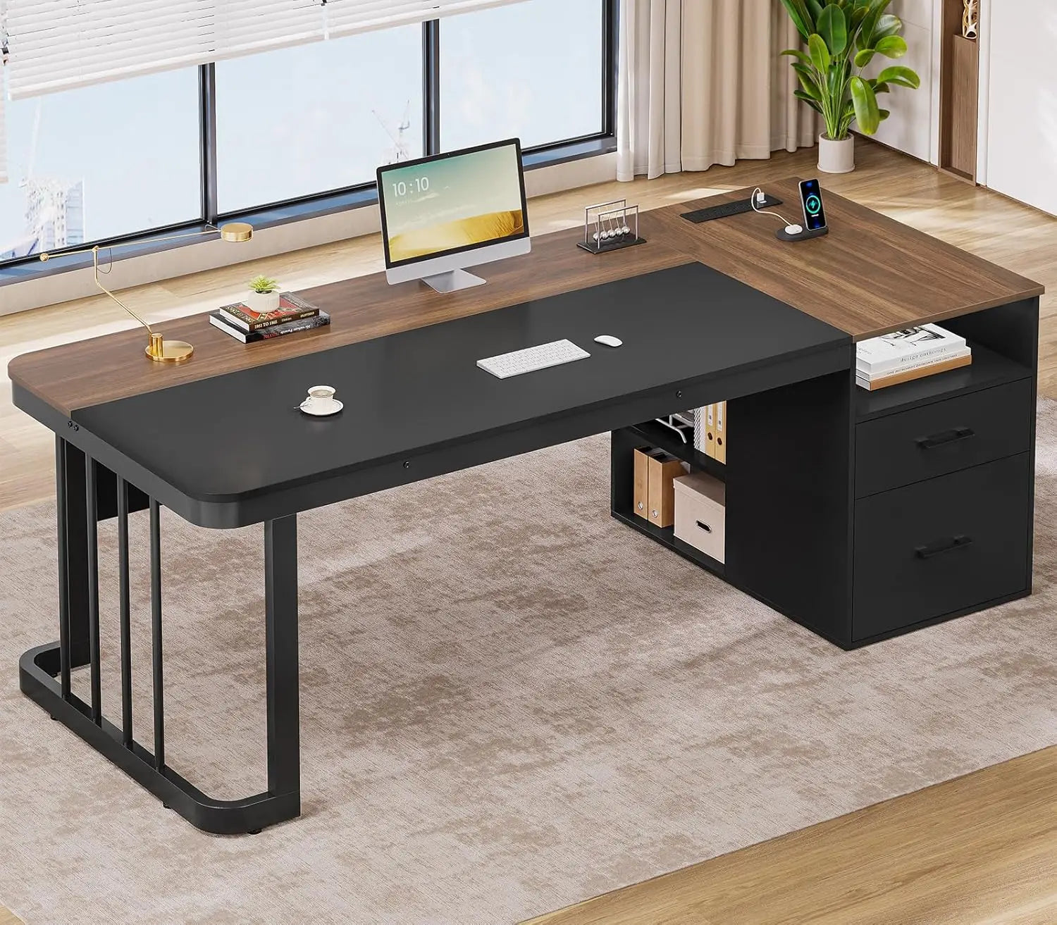 Modern executive l-shaped desk with a black and wood-grain top, sleek metal legs, built-in drawers, and a power outlet for efficient workspace organization.