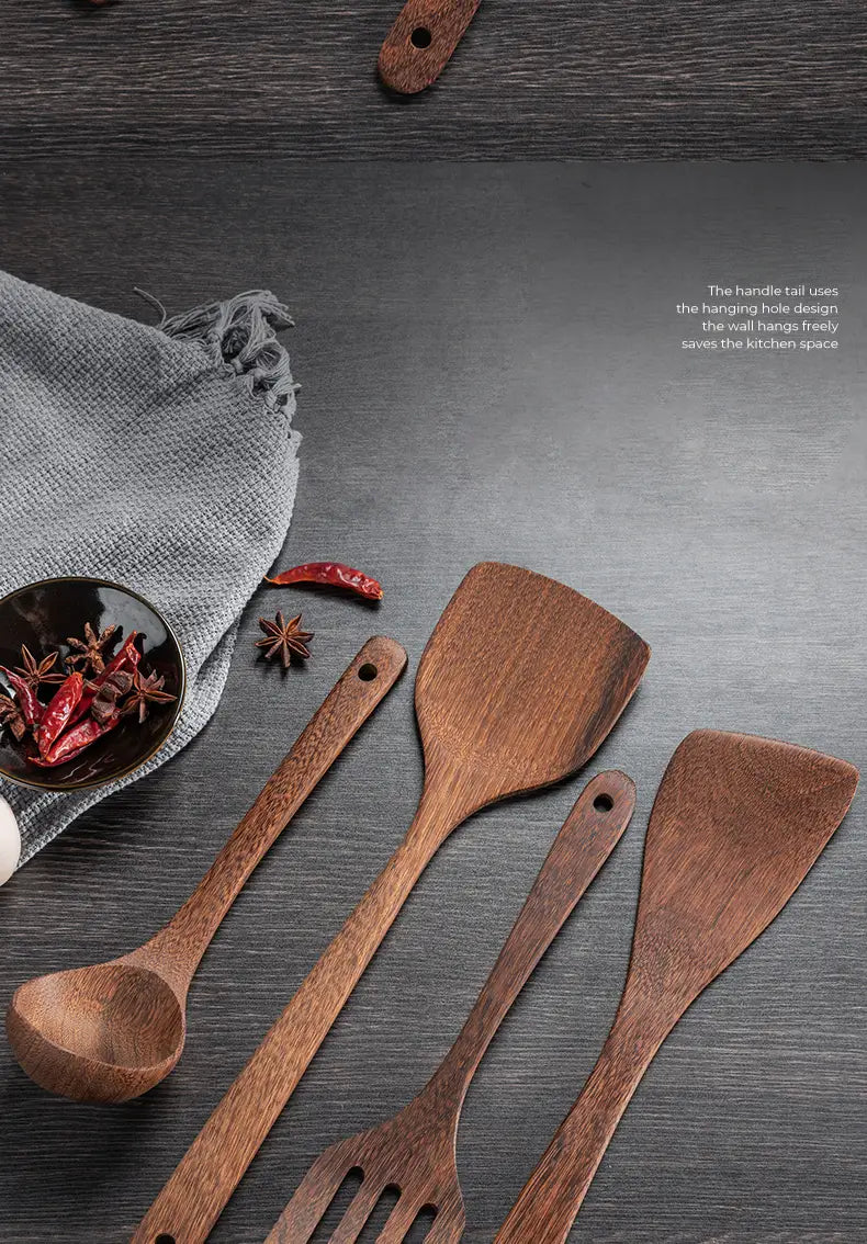 Set of four wooden kitchen utensils with smooth rich brown finishes and rounded handles featuring hanging holes for wall mounting designed for non-stick cookware.