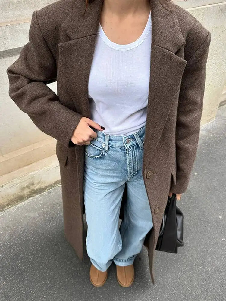 Brown wool blend overcoat for women with a classic double-breasted design ideal for winter commuting.