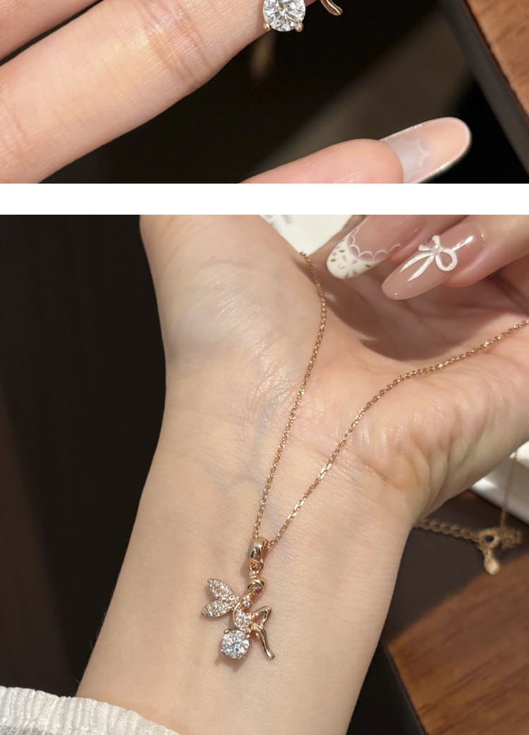 繊細なモアッサナイトのエルフペンダント シルバー ローズゴールド ネックレス。羽と胴体にきらめくクリアクリスタルをあしらい、柔らかな手首に優雅に寄り添うように着用できます。