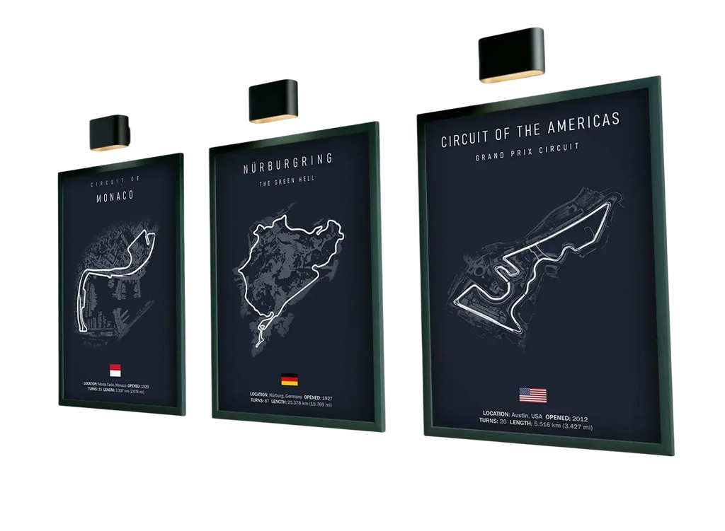 Three framed f1 imola monaco track circuit canvas paintings with white line drawings on dark blue home decor backgrounds