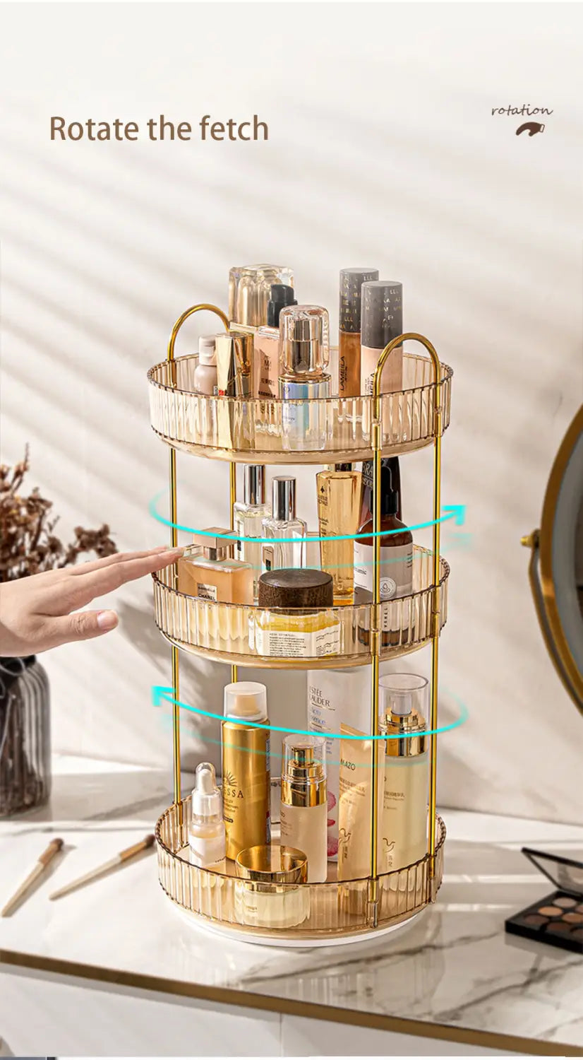Goldfarbener, dreistufiger Dreh-Make-up-Organizer mit schlankem geripptem Metall-Design und einer robusten Metallstange für eine große Aufbewahrung.